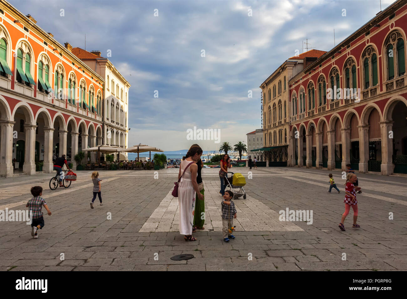 Children and mums in the grand Trg Republike, popularly known as Prokurative, Split, Croatia Stock Photo