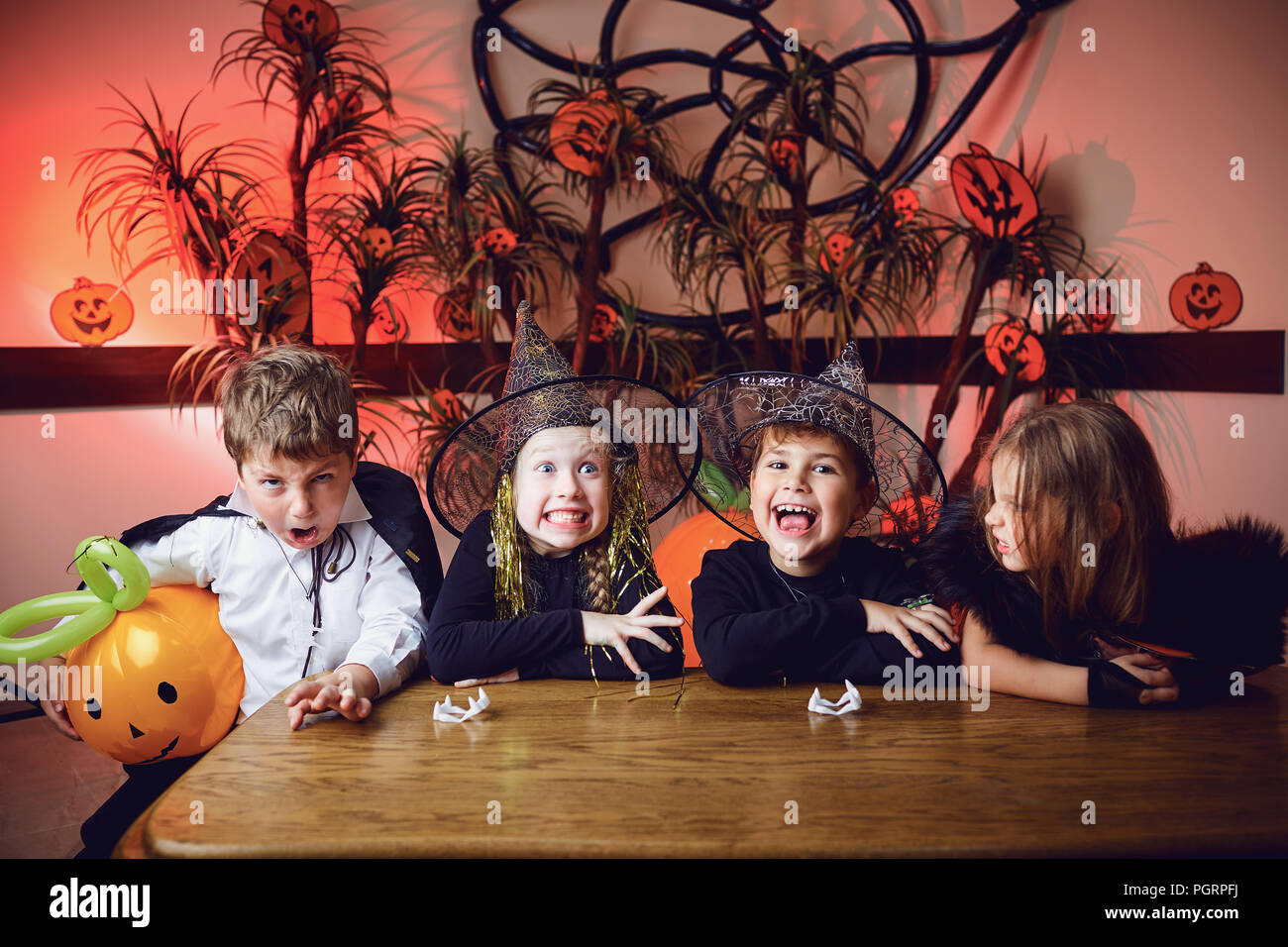 A group of children in costumes on a Halloween holiday Stock Photo