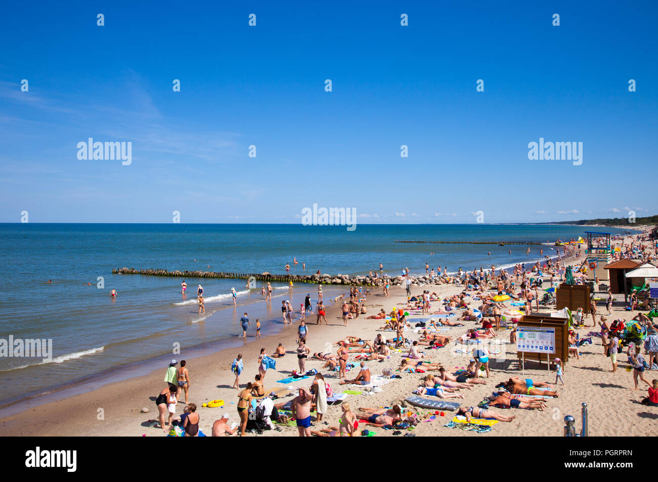 Zelenogradsk, Russia - August 17, 2017: A crowd of bathers in Zelenogradsk beach located on the Baltic Sea coast, Russia. Stock Photo