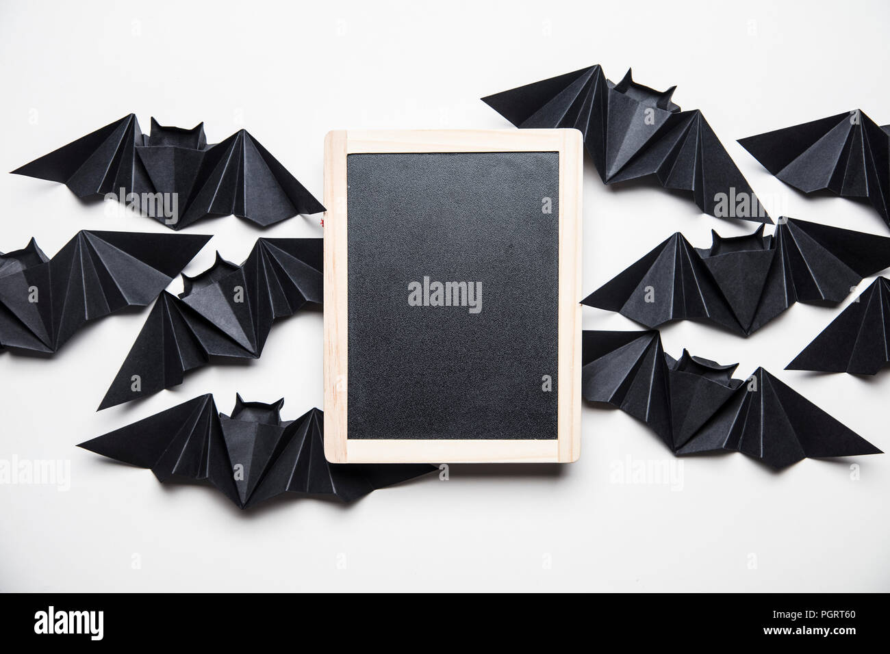 Halloween Origami Paper Dracula Bats With A Blank Blackboard