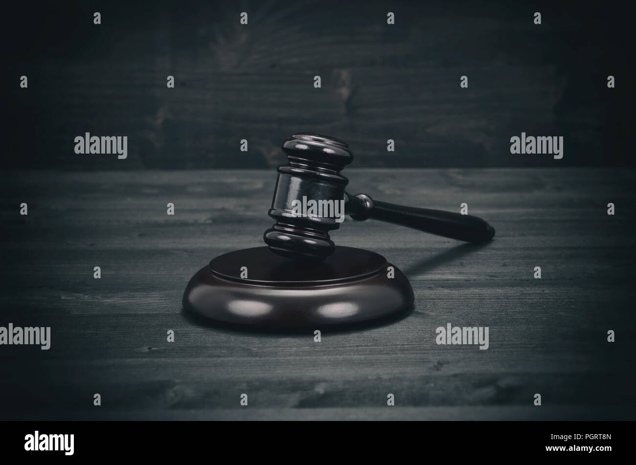Law and Justice, Legality concept, Judge Gavel on a black wooden background. Stock Photo