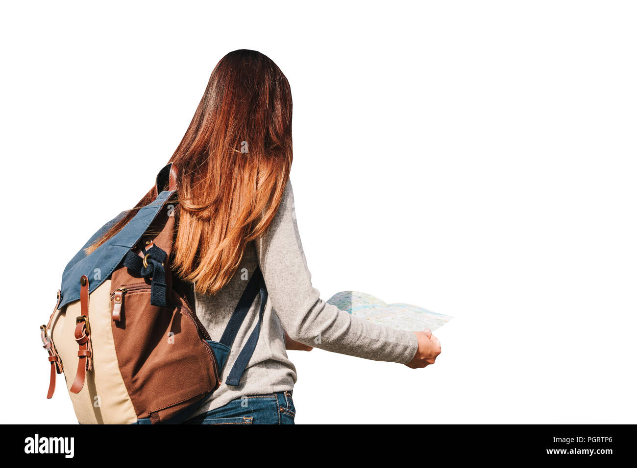 Girl or traveler or tourist with a backpack is looking at a map