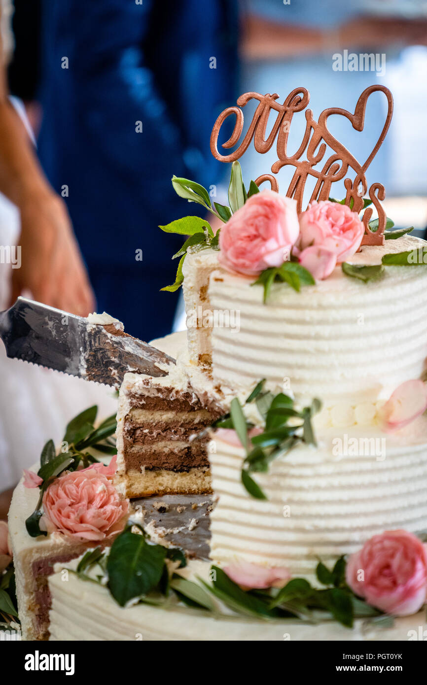 the wedding cake with mr and mrs lettering Stock Photo - Alamy