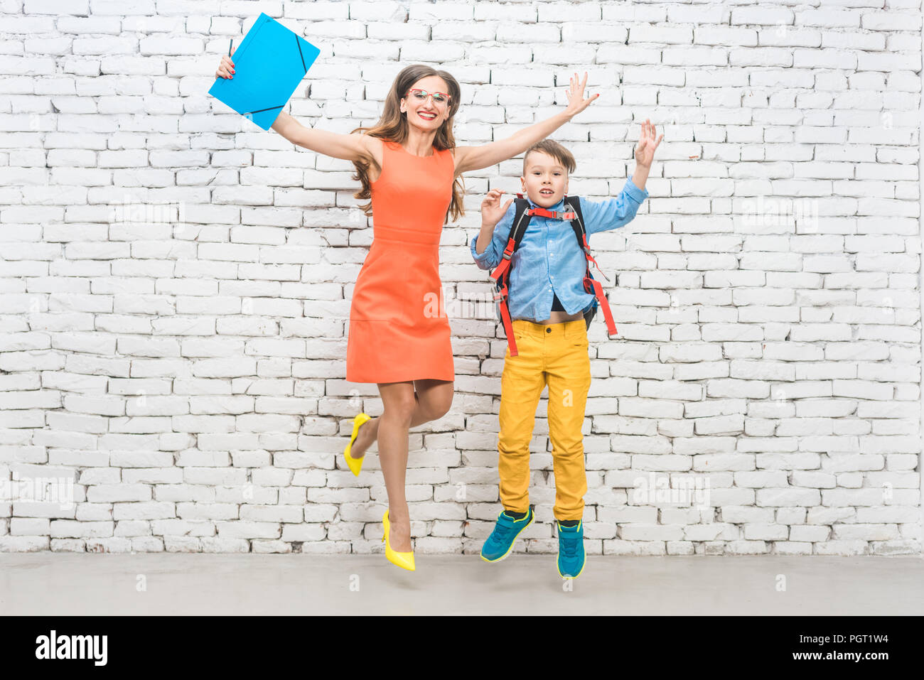 Student or pupil and teacher being excited about school  Stock Photo