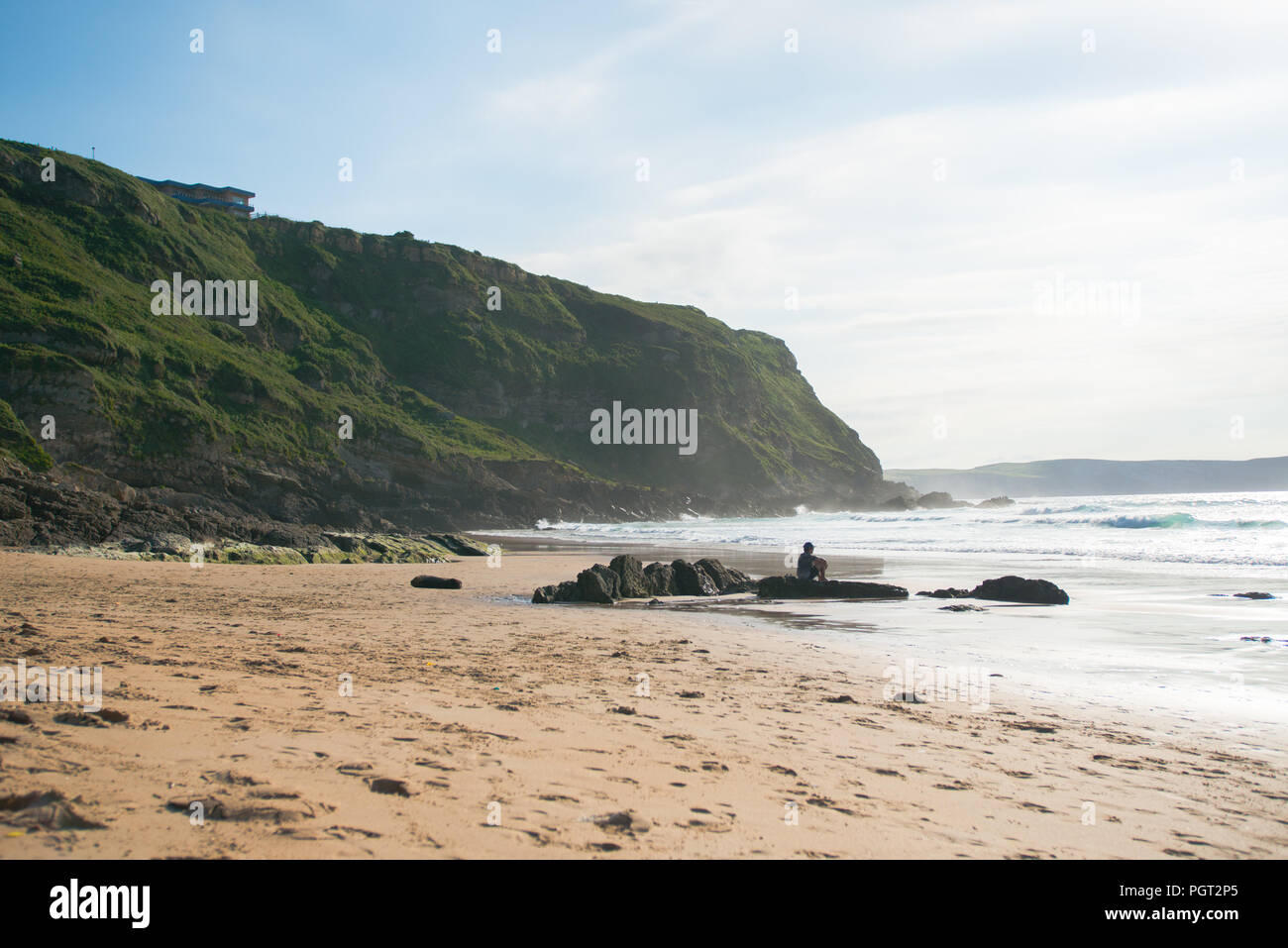 Lonely man at beach in Suances - Cantabria Stock Photo