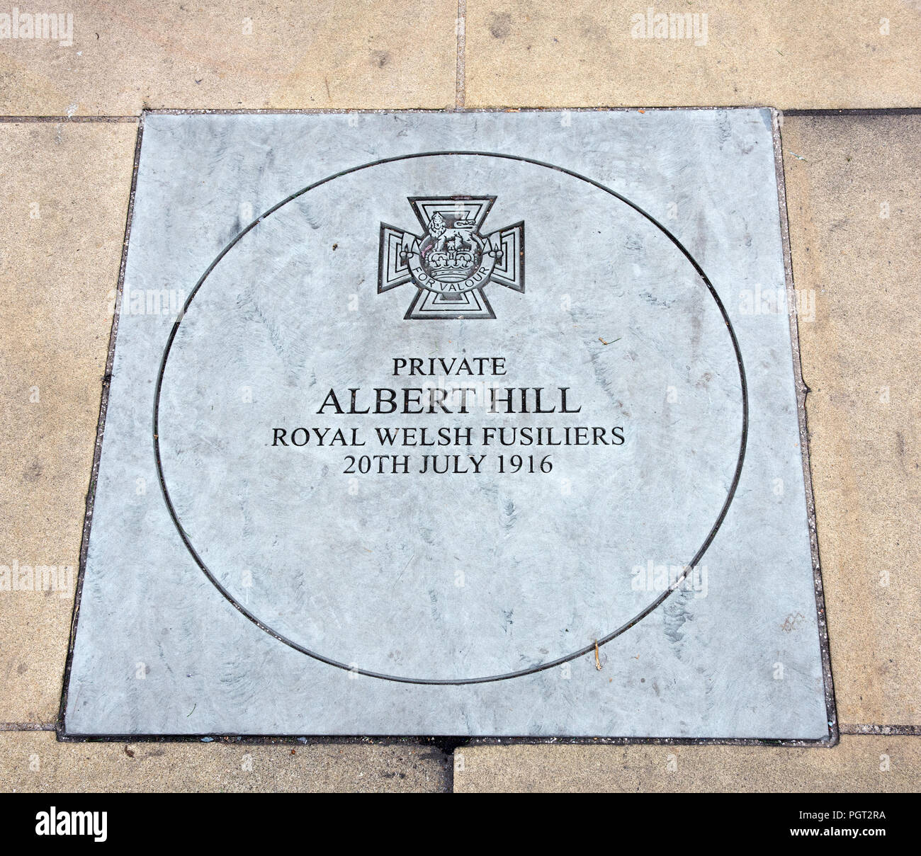 Plaque at foot of Manchester England war memorial showing Victoria Cross awarded Private Albert Hill Royal Welsh Fusiliers 20th July 1916 Stock Photo