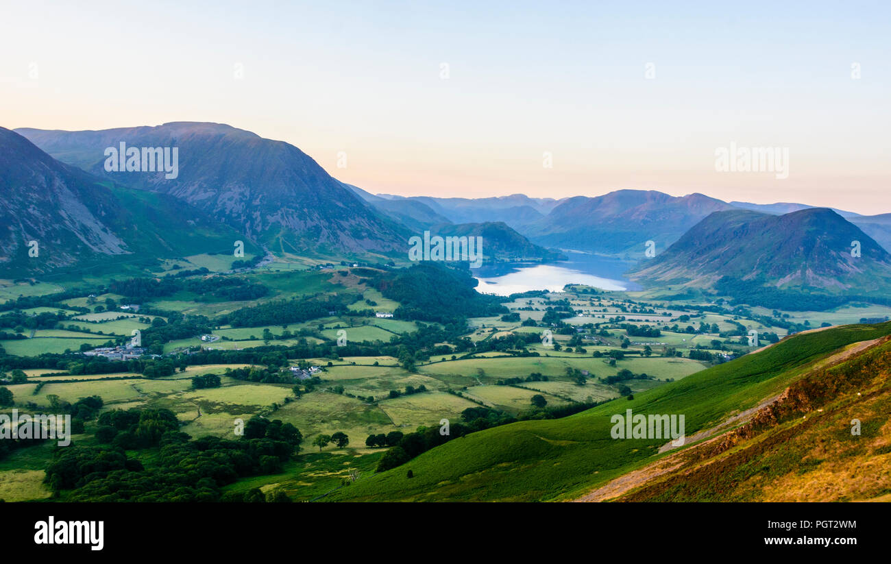 Sunrise over Crummock Water with Mellbreak fell, from Low fell, Buttermere, Lake District, Cumbria, England, UK Stock Photo