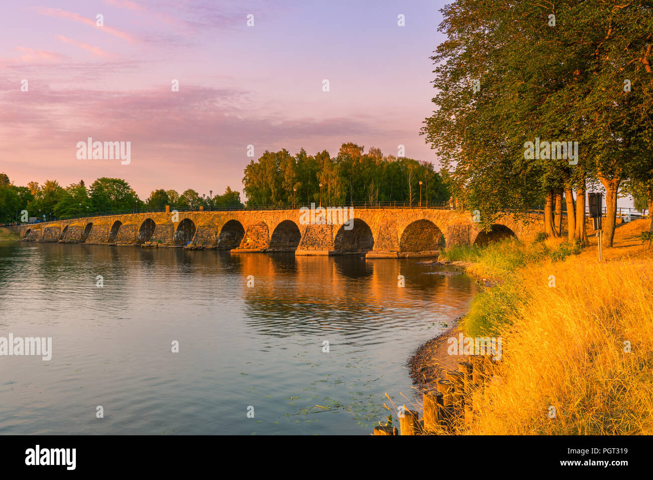 Sweden´s longest stone arch bridge can be found in Karlstad. With its 168 meters and twelve spans. Stock Photo