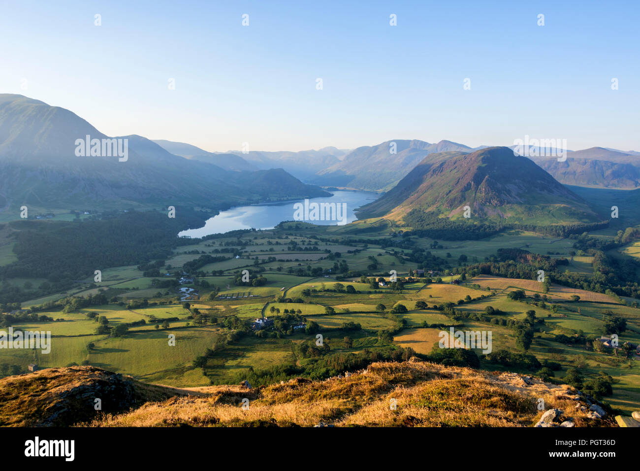 Sunrise over Crummock Water with Mellbreak fell, from Low fell, Buttermere, Lake District, Cumbria, England, UK Stock Photo