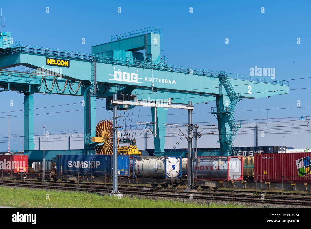 ROTTERDAM, NETHERLANDS MAY 6, 2017 Crane loading containers on a