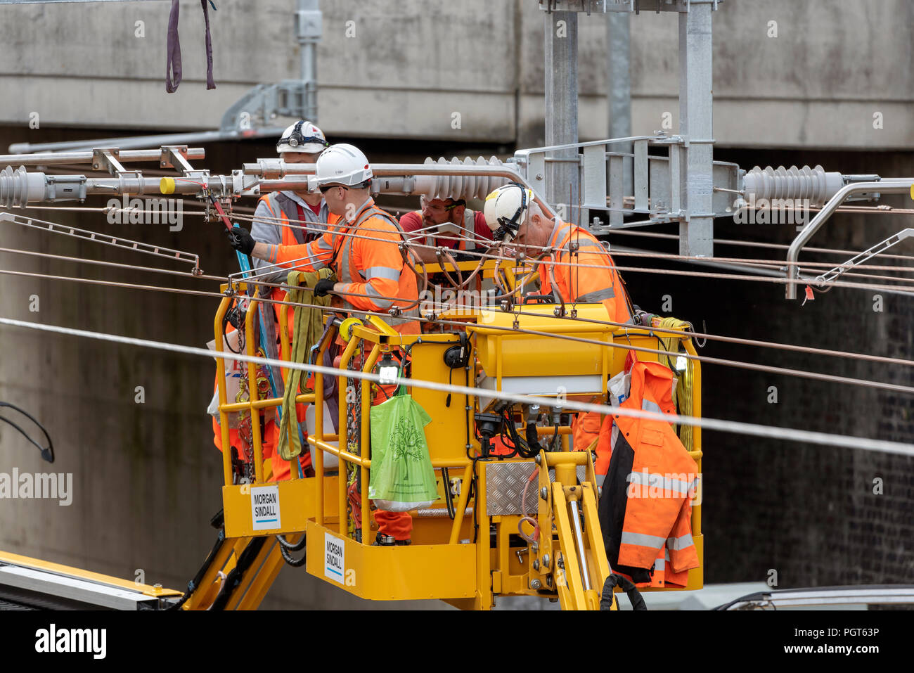 Newbury Station, Berkshire UK. Engineers working on the electrification