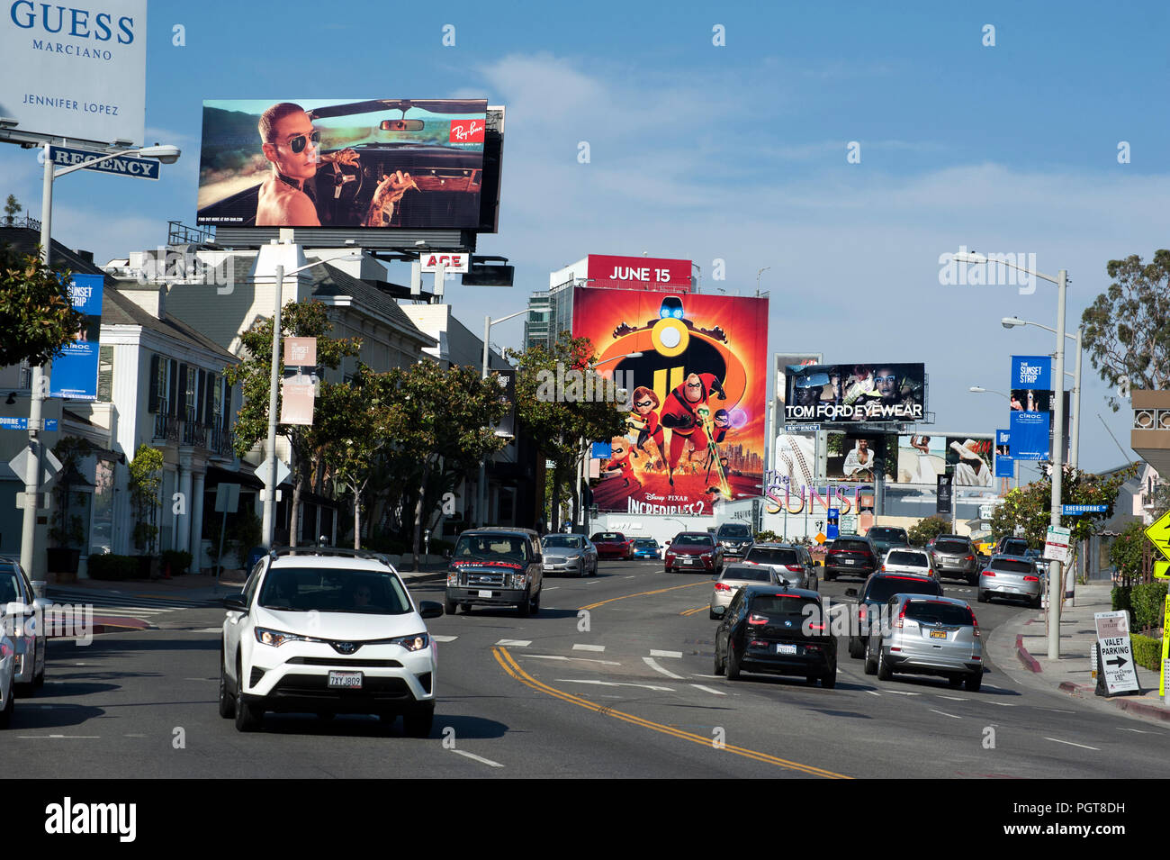 Large billboards line the Sunset Strip in the West Hollywood neighhborhood of Los Angeles, CA Stock Photo