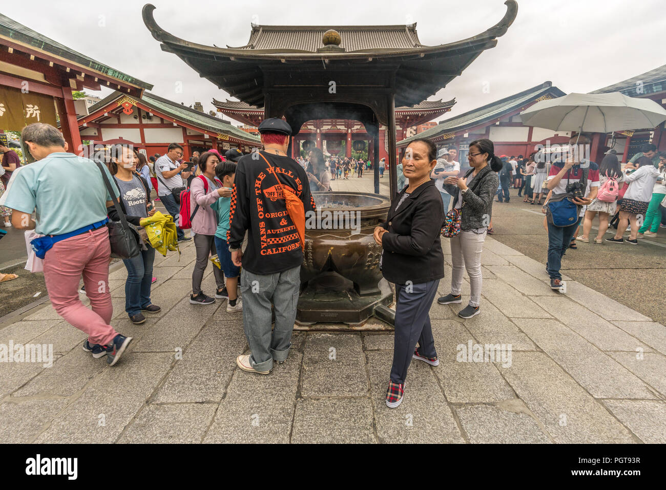 Incense burner in front of temple hi-res stock photography and images ...