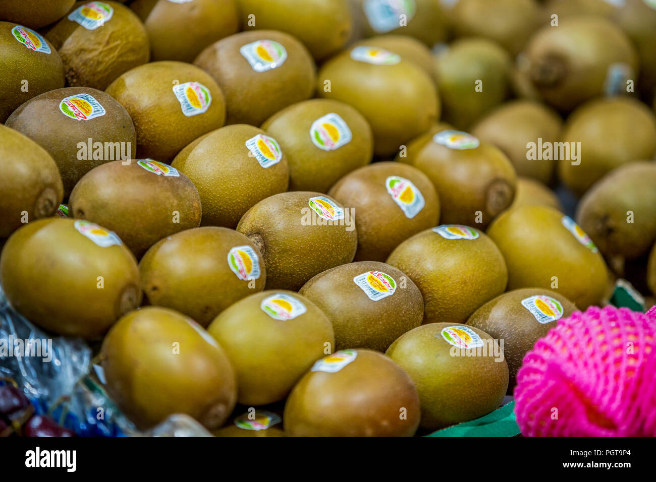 kiwifruit, Kiwi fruits on display in market Stock Photo