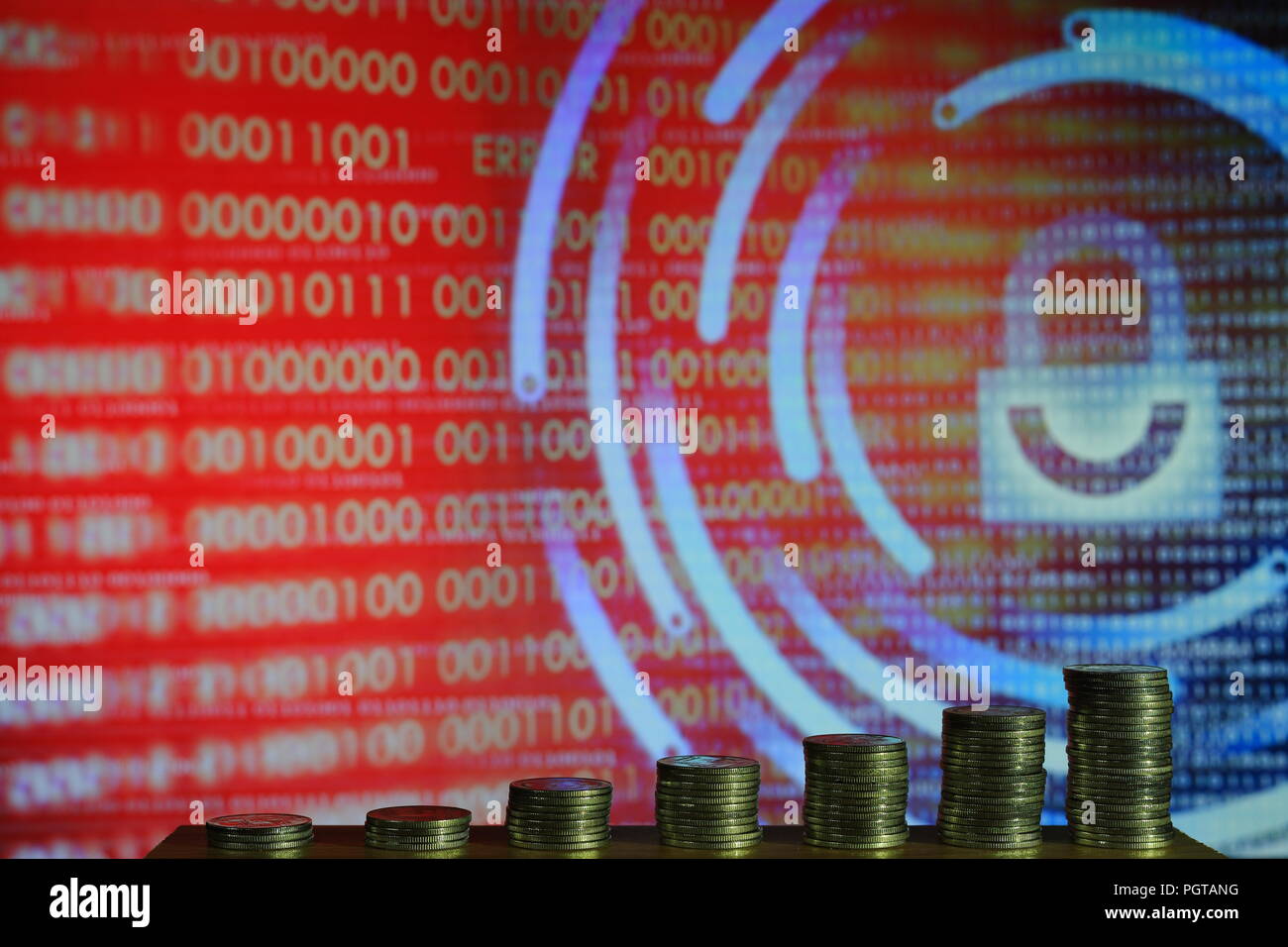 secured business. big coin piles in front of blue binary code