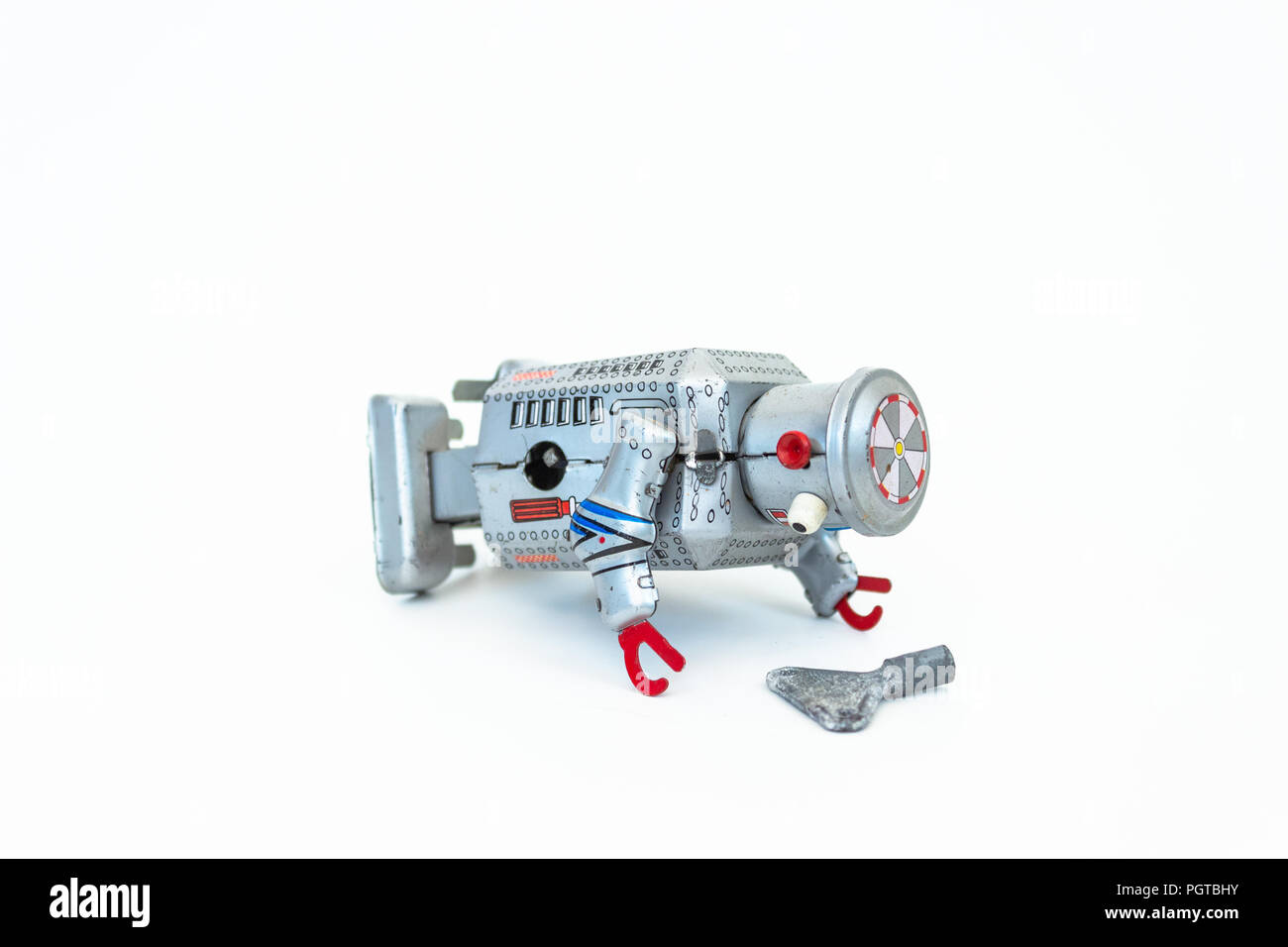 clockwork robot with key laying Stock Photo