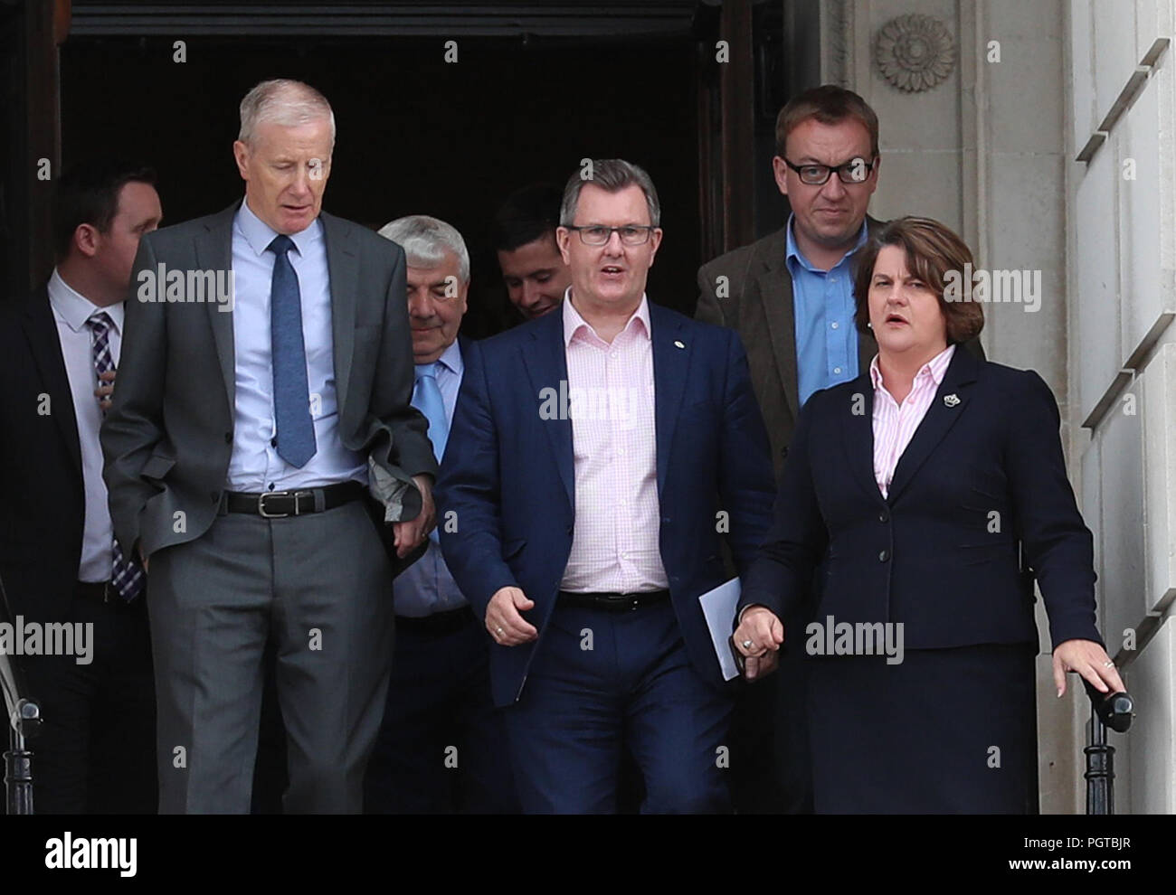 DUP leader Arlene Foster and party colleagues Gregory Campbell (left), Sir Jeffrey Donaldson (centre) and Christopher Stalford (right, blue shirt) arrive for a press conference outside Parliament Buildings at Stormont in Belfast. The Government has acknowledged the deep frustration of the public in Northern Ireland as the region reached an unwanted milestone for non-governance. Stock Photo