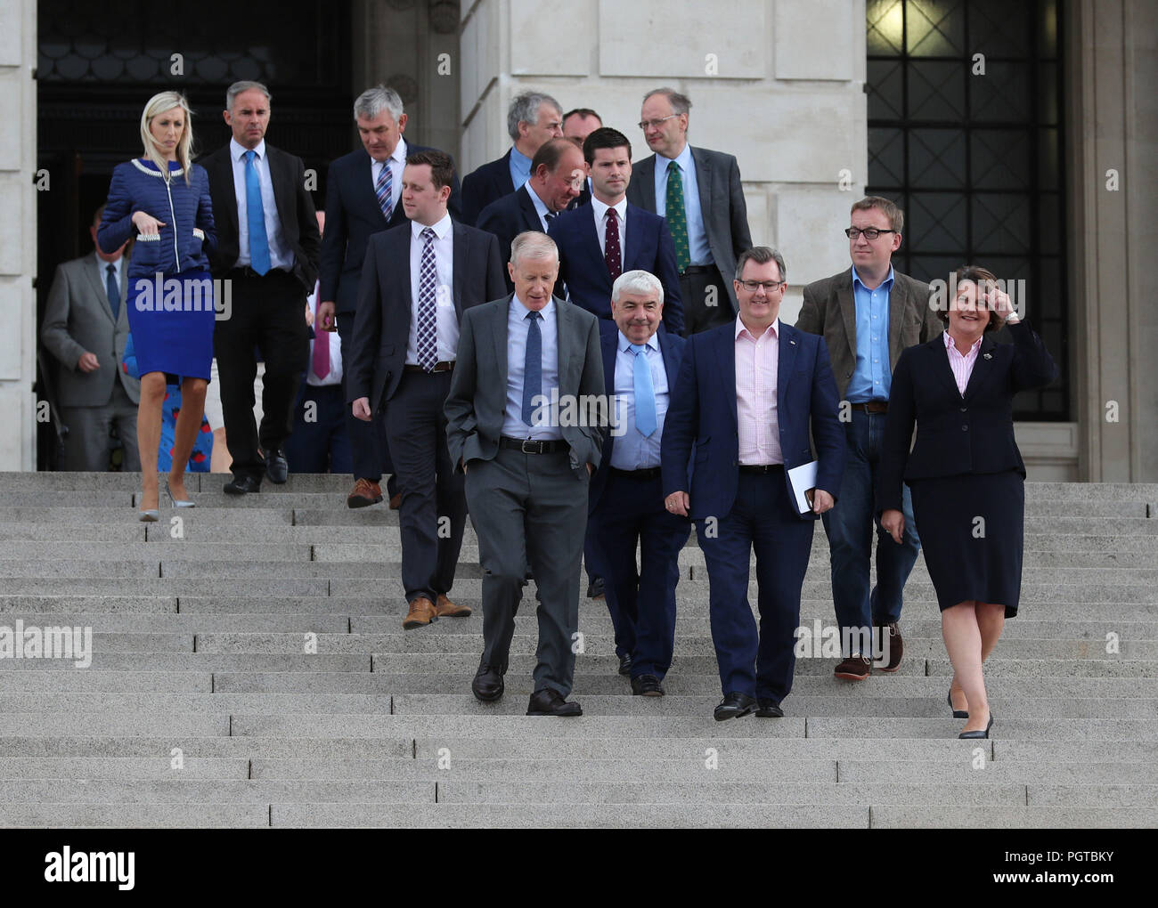 DUP leader Arlene Foster (right) and party colleagues Gregory Campbell (front left), Sir Jeffrey Donaldson (front, pink shirt) and Christopher Stalford (front right, blue shirt) arrive for a press conference outside Parliament Buildings at Stormont in Belfast. The Government has acknowledged the deep frustration of the public in Northern Ireland as the region reached an unwanted milestone for non-governance. Stock Photo