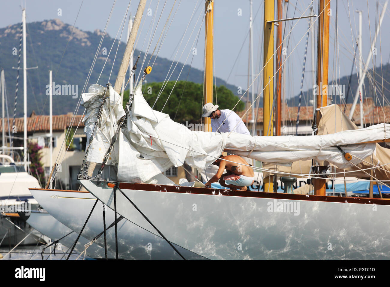 yacht and crew, Port Grimaud Stock Photo