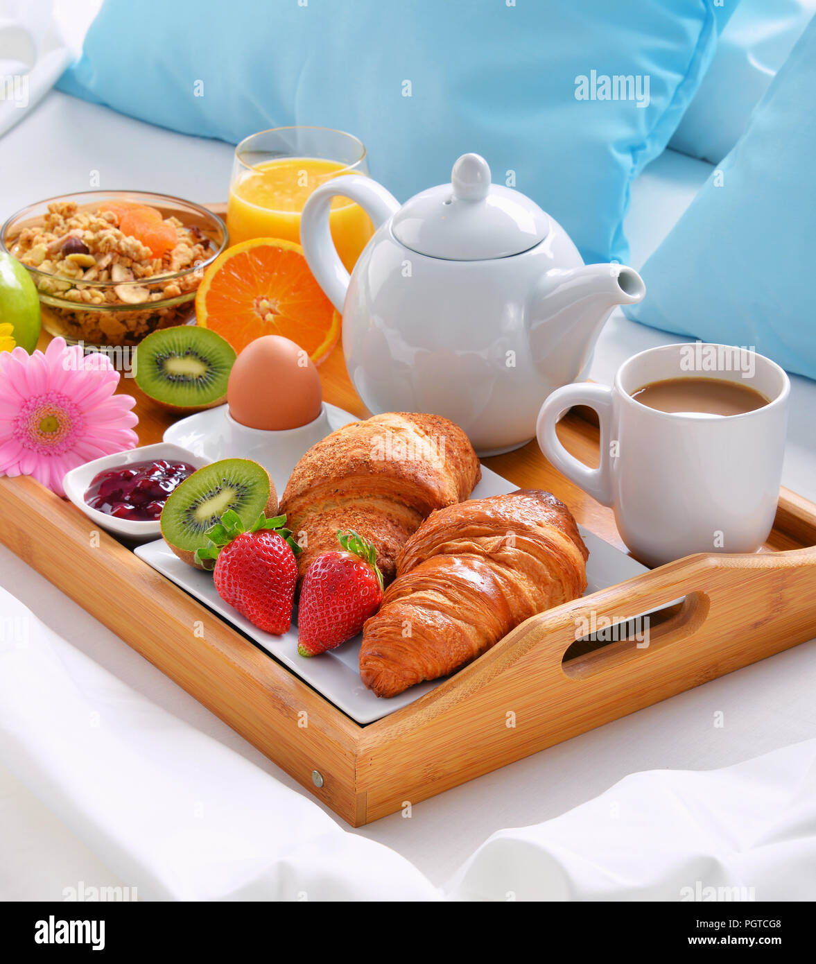 Breakfast tray in bed in hotel room Stock Photo - Alamy