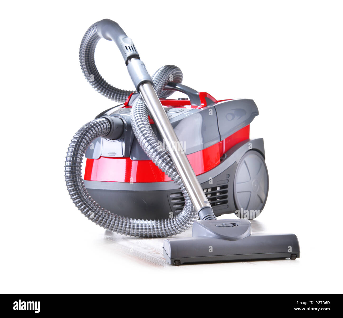 Canister vacuum cleaner for home use isolated on white. Stock Photo