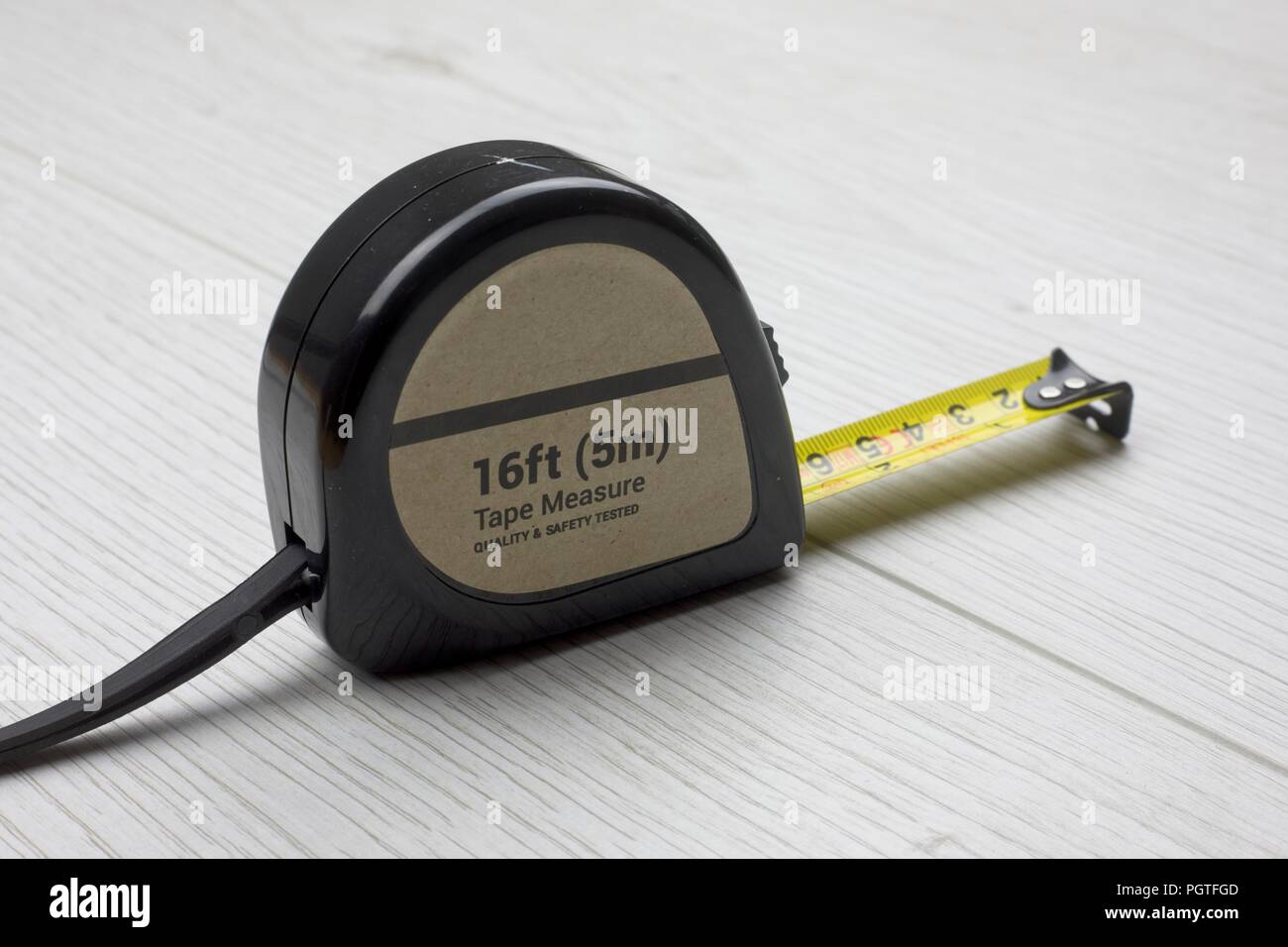 Tape measure, retractable,in metric and imperial measuremnts Stock Photo Alamy