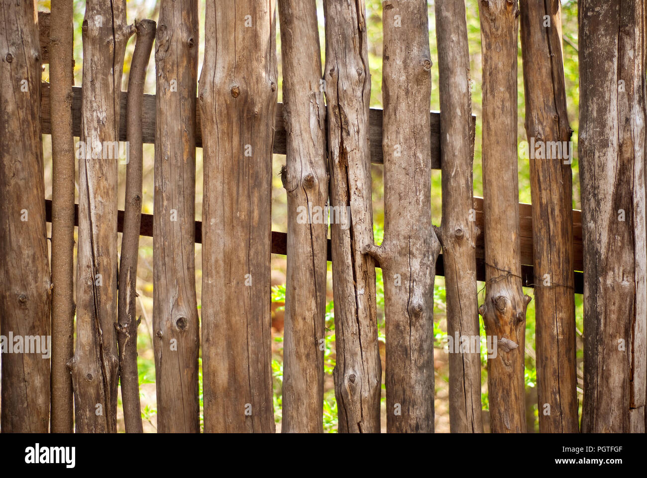 old fence with a visible behind him grass as a background Stock Photo ...