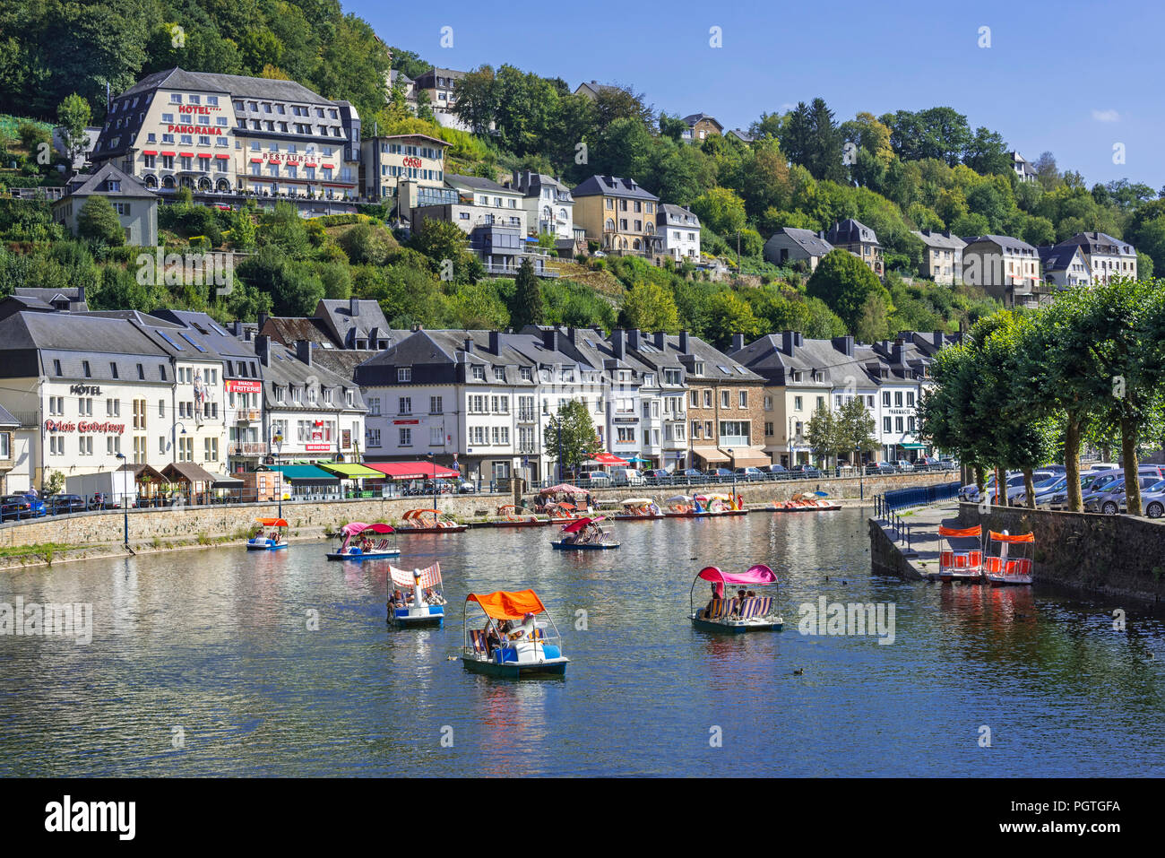 Paddle boats with tourists on the Semois river in the city Bouillon in