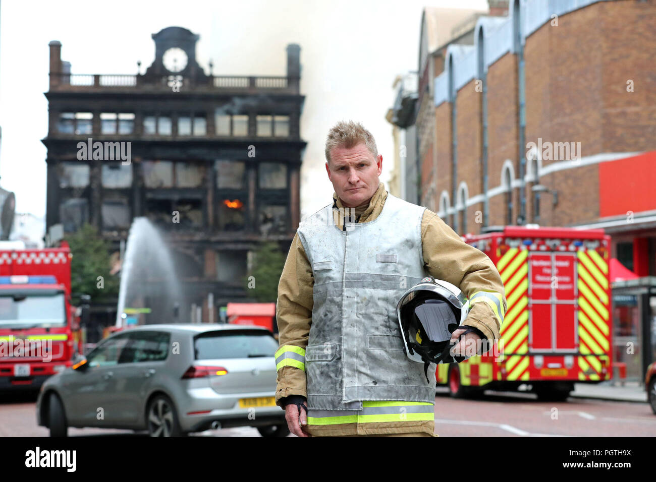 Assistant Chief Fire and Rescue Officer from Northern Ireland Fire & Rescue Service, Michael Graham, outside the Primark store in Belfast city centre where a major blaze broke out on Tuesday, following a press conference. Stock Photo
