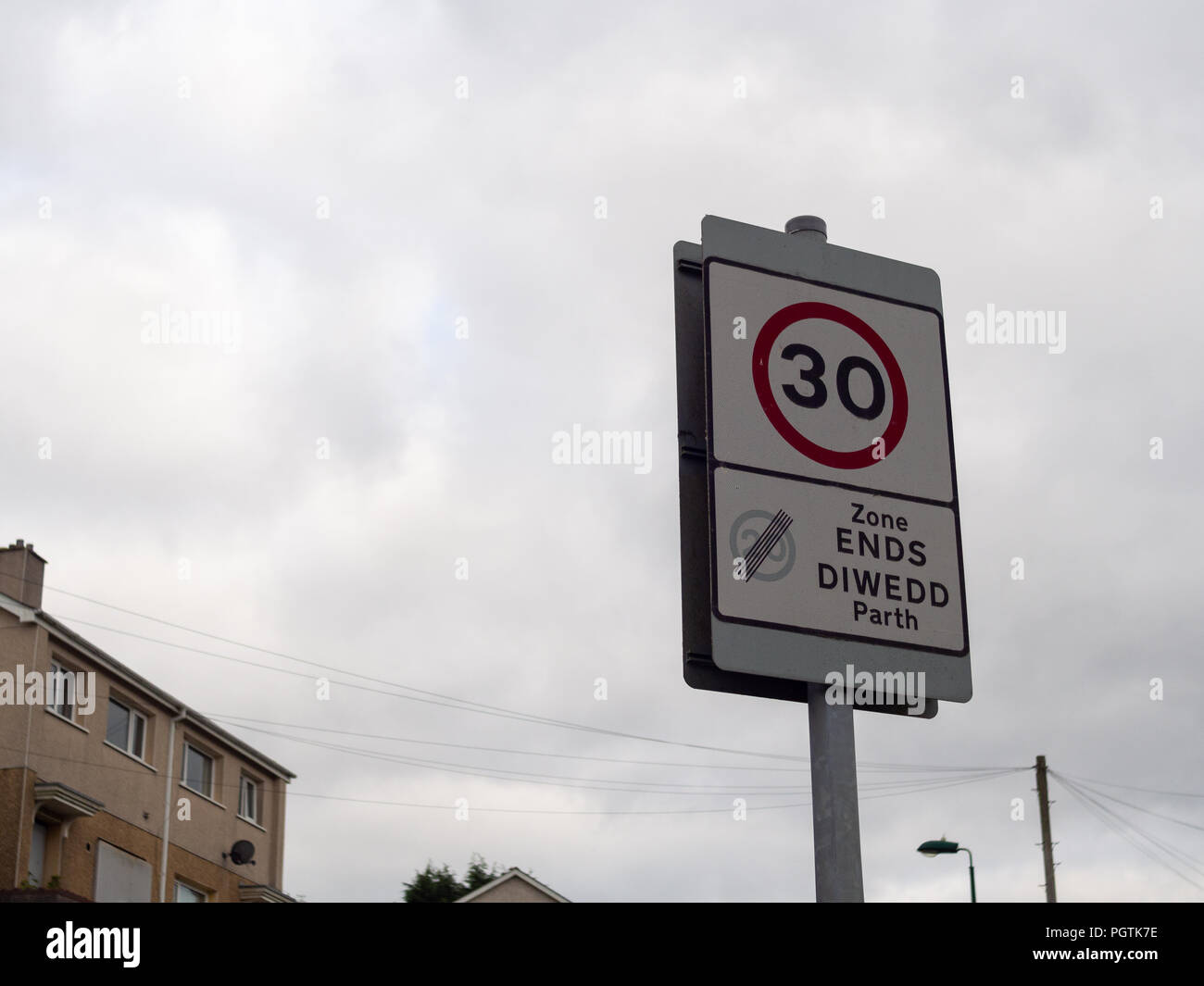 Sign of maximum speed of 30 miles per hour and 20 mph zone ends, UK Stock Photo
