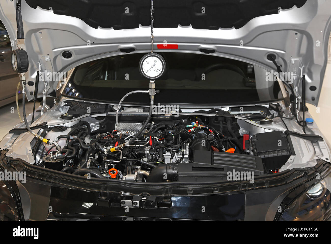 Petrol engine automotive compression test gauge service Stock Photo Alamy