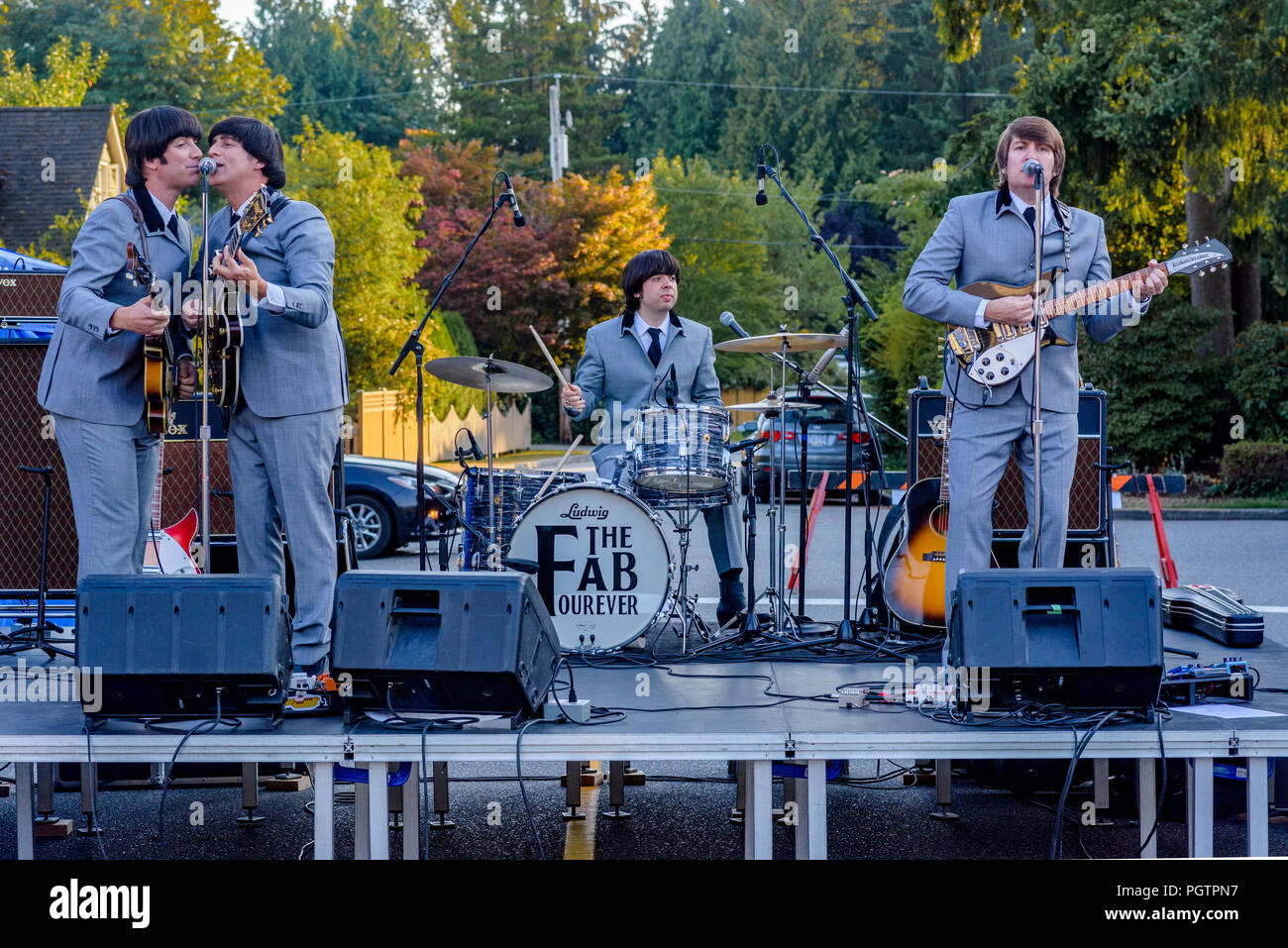The Fab Fourever, Beatles cover band, Edgemont Village, N. Vancouver, British Columbia, Canada Stock Photo