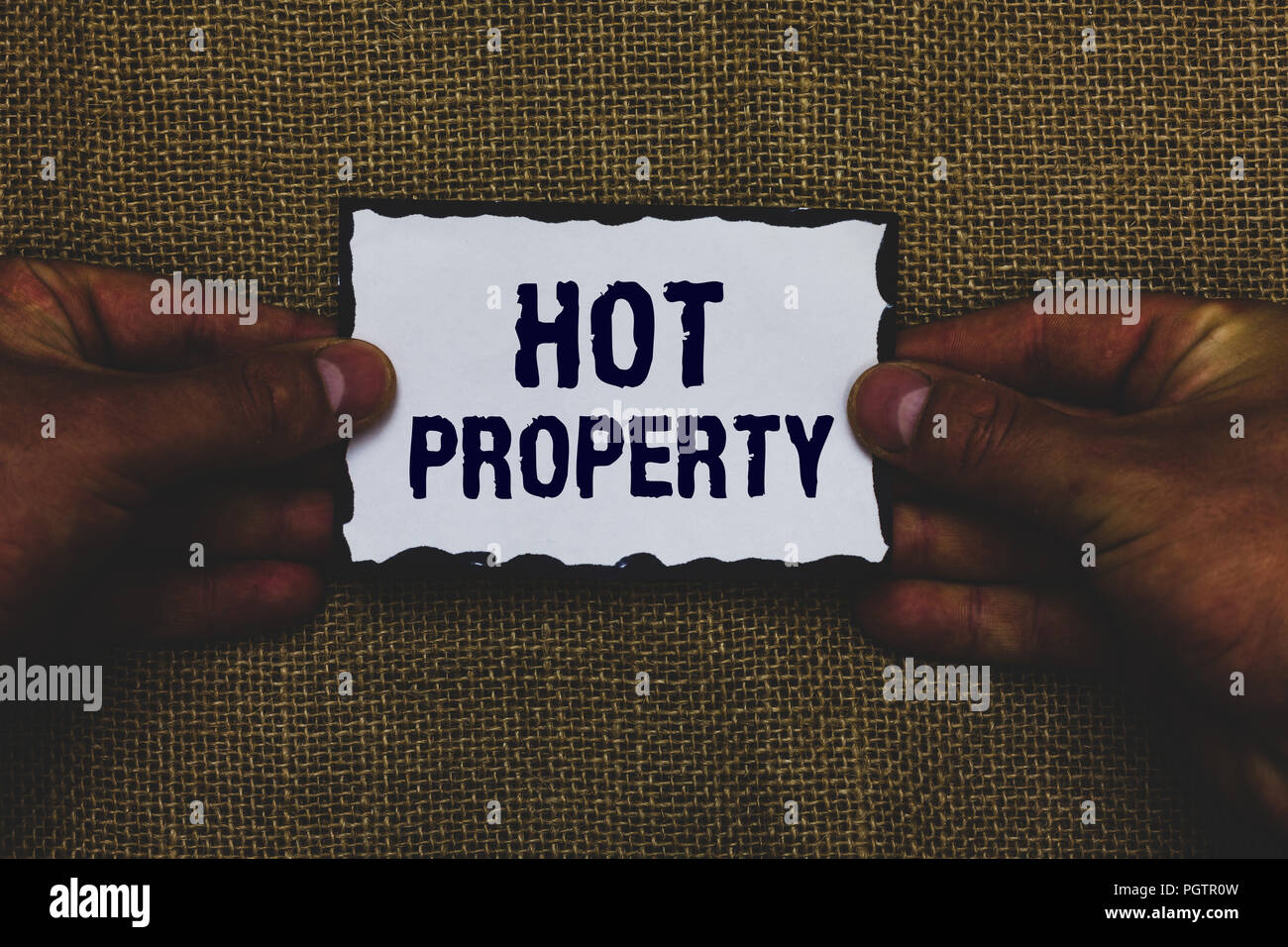 Handwriting Text Hot Property Concept Meaning Something Which Is Sought After Or Is Heavily Demanded Man Holding Piece Paper Black Borders Jute Backg Stock Photo Alamy