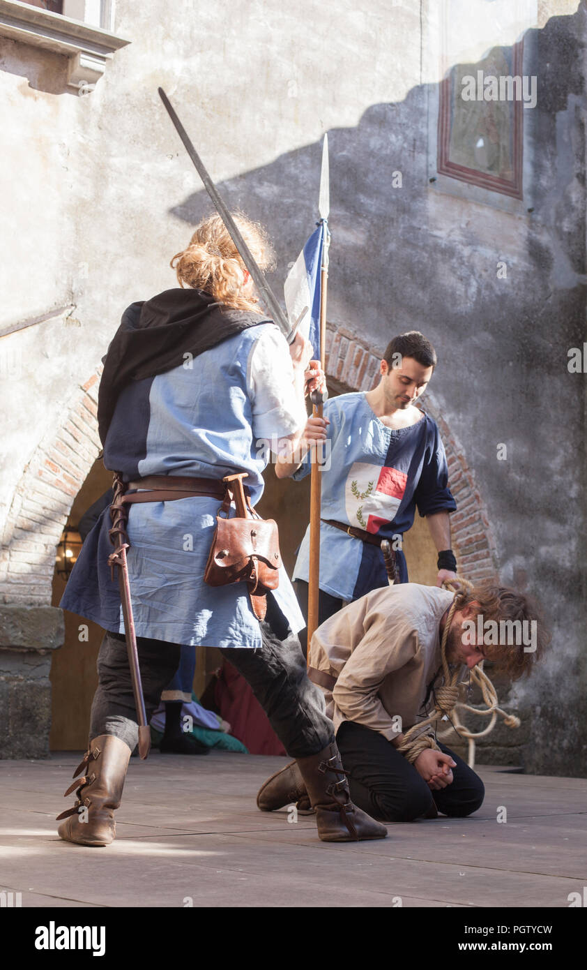 The beheading of the convict on the castle yard at the medieval festival 'Al cospetto dei Conti di Gorizia 2018' Stock Photo