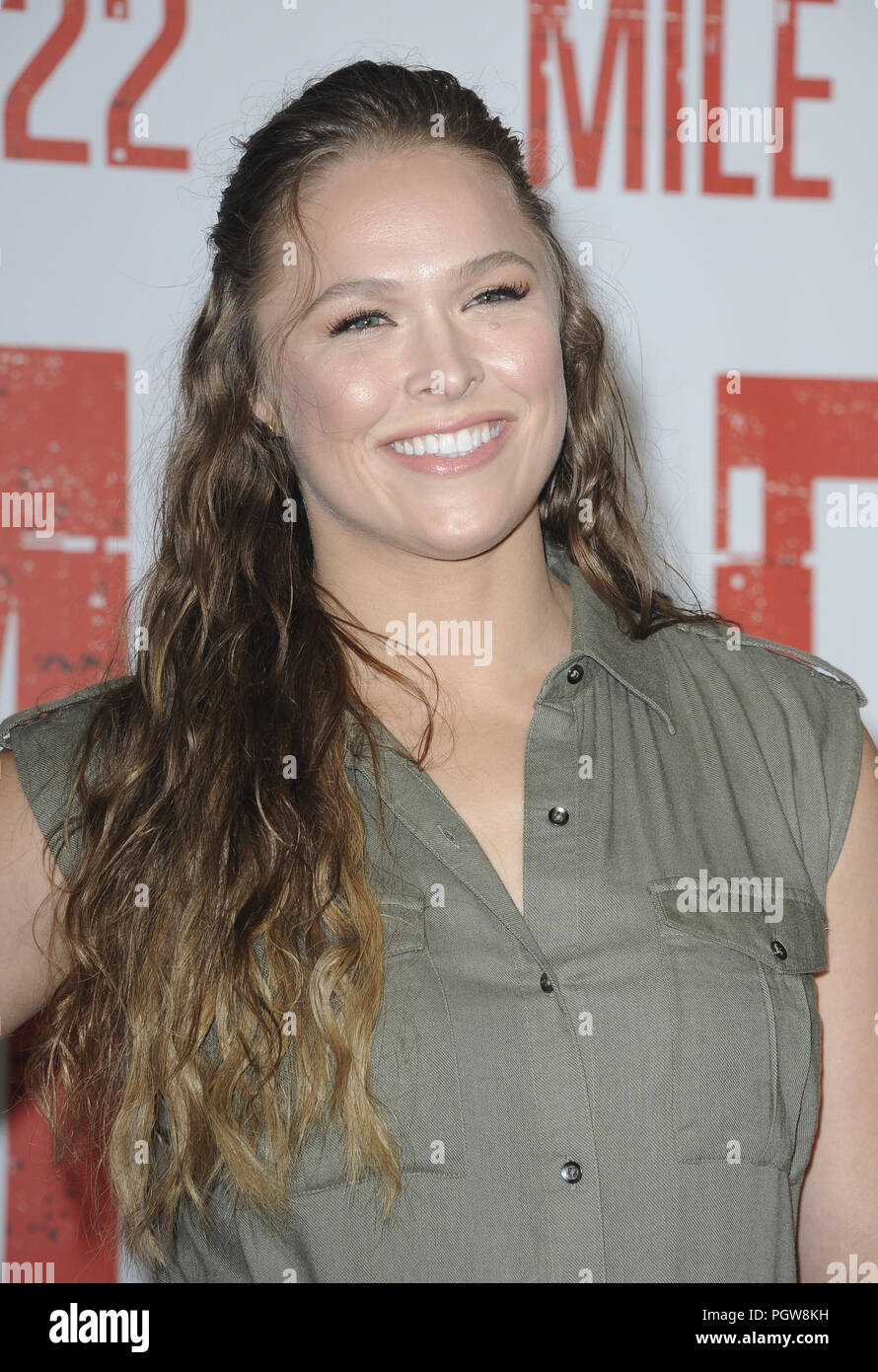 Actors attend 'Mile 22' Los Angeles Photocall at The Four Seasons