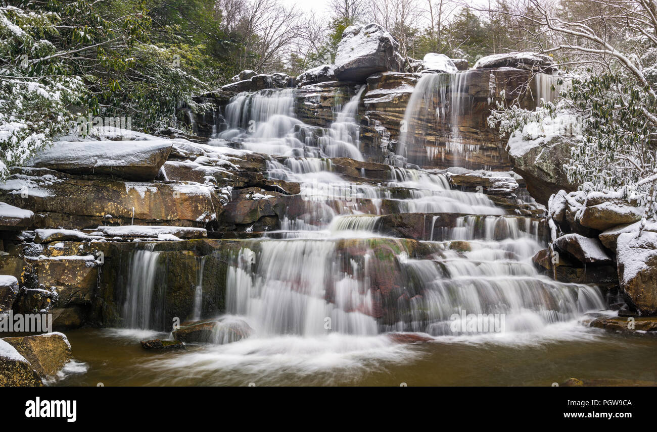 Pendleton run flows over the tall, stratified rock wall on its way to the Blackwater River in West Virginia. Stock Photo