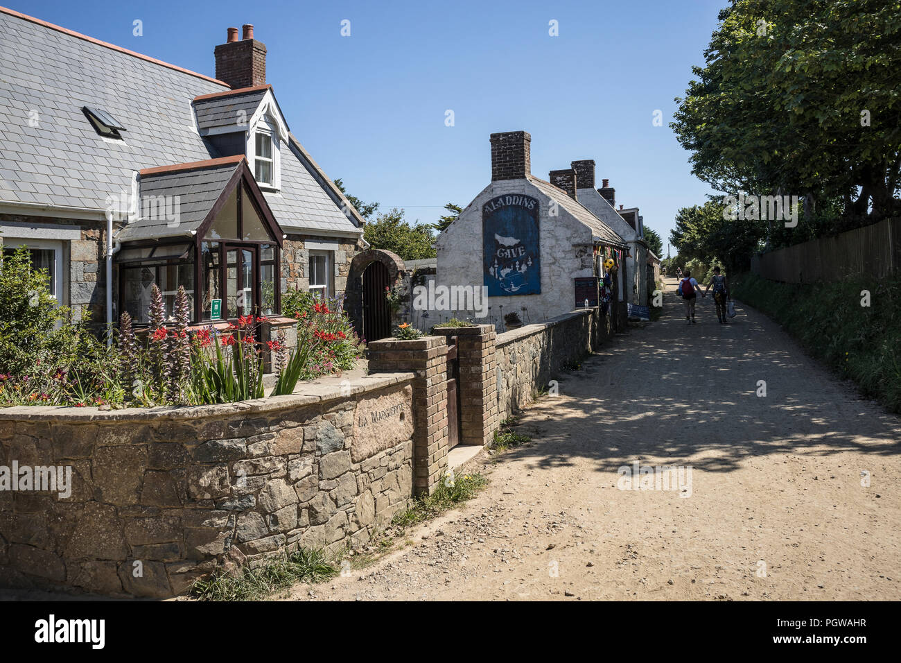 Typical Cottages On Sark Island Near Guernsey And Part Of The