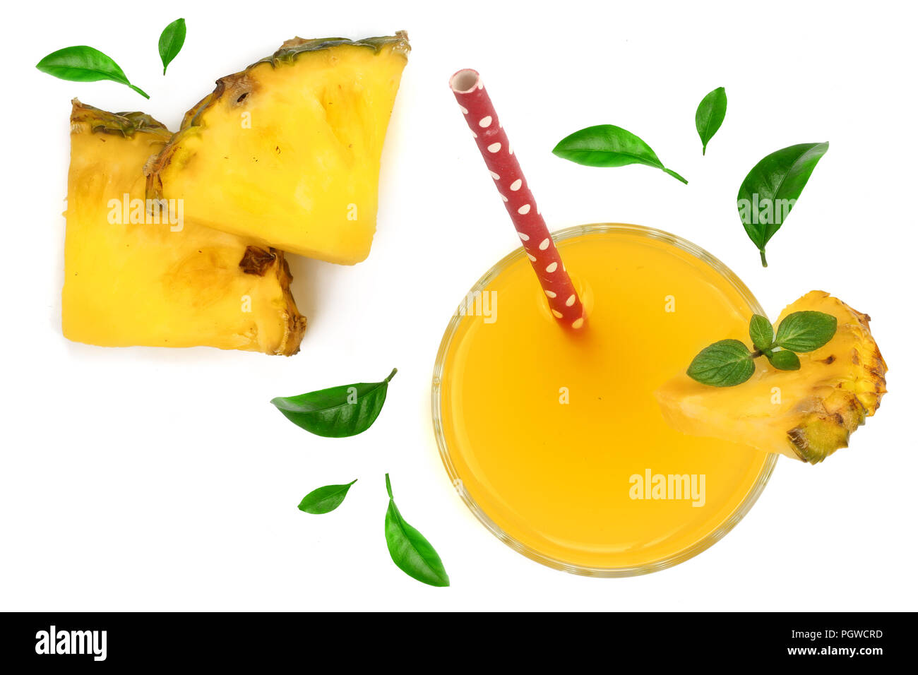 pineapple juice in a glass with pineapple slices decorated with green ...