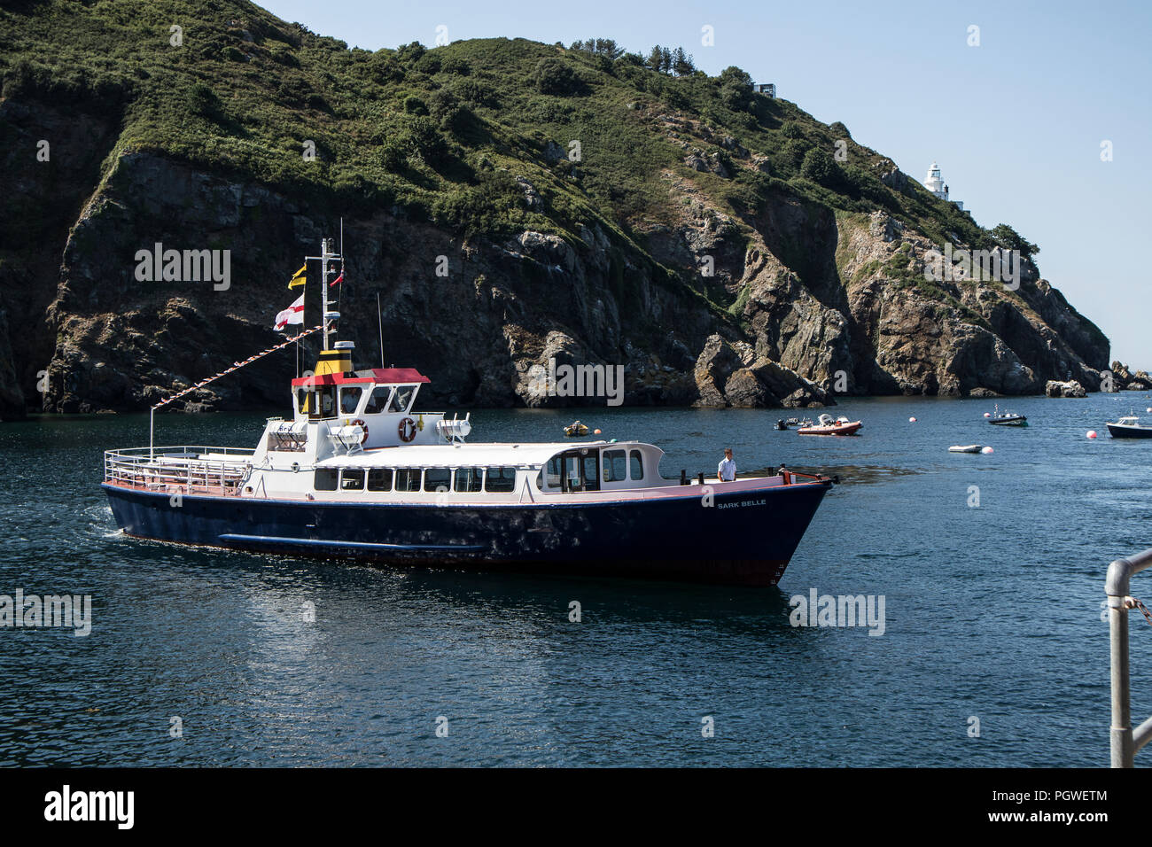 MV Sark Belle docking at the harbour at Sark Island, near Guernsey, and  part of the Channel Islands. This is the daily Jersey to Sark Ferry service  Stock Photo - Alamy