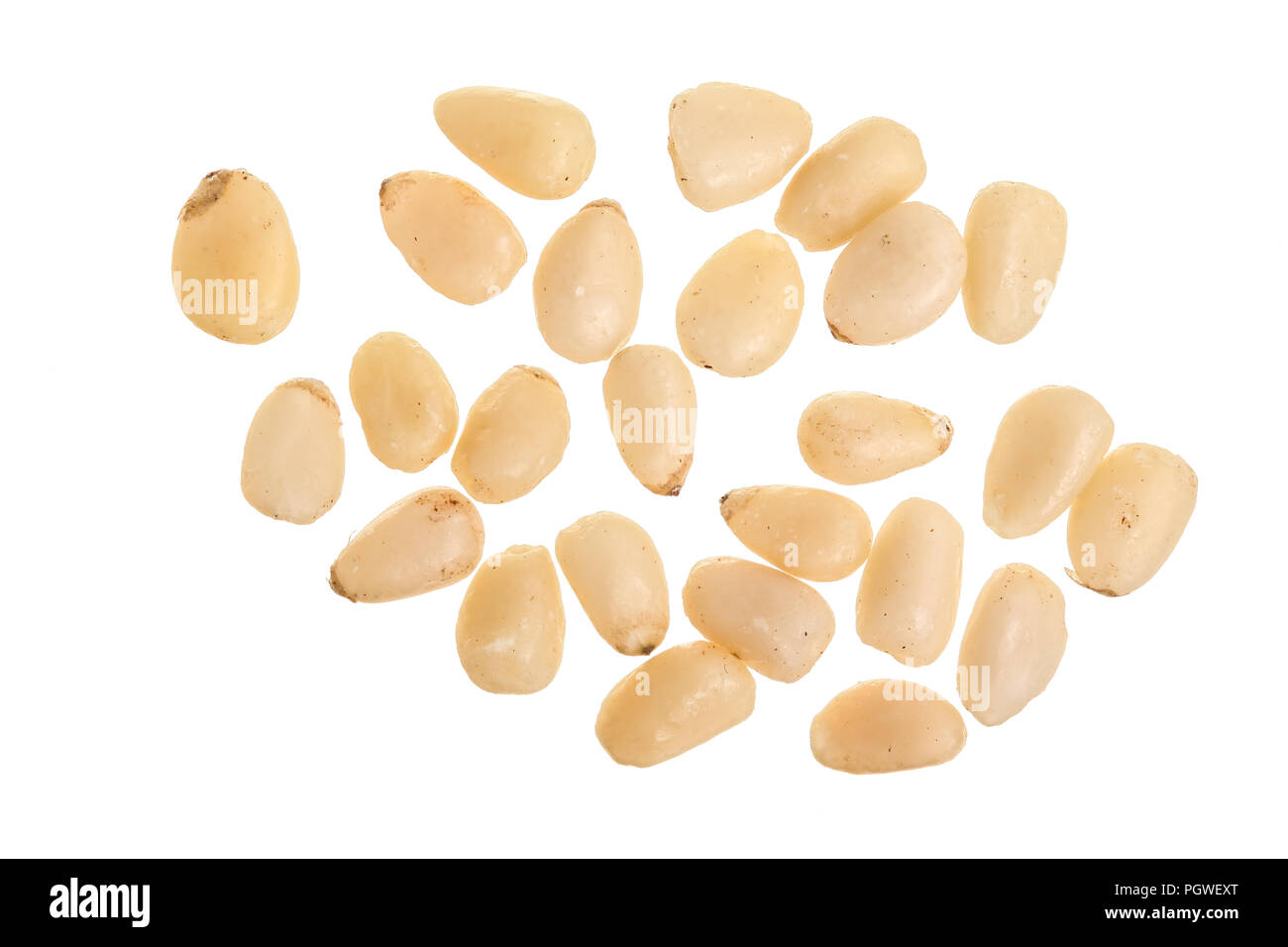 Shelled cedar pine nuts isolated on white background. Top view. Flat