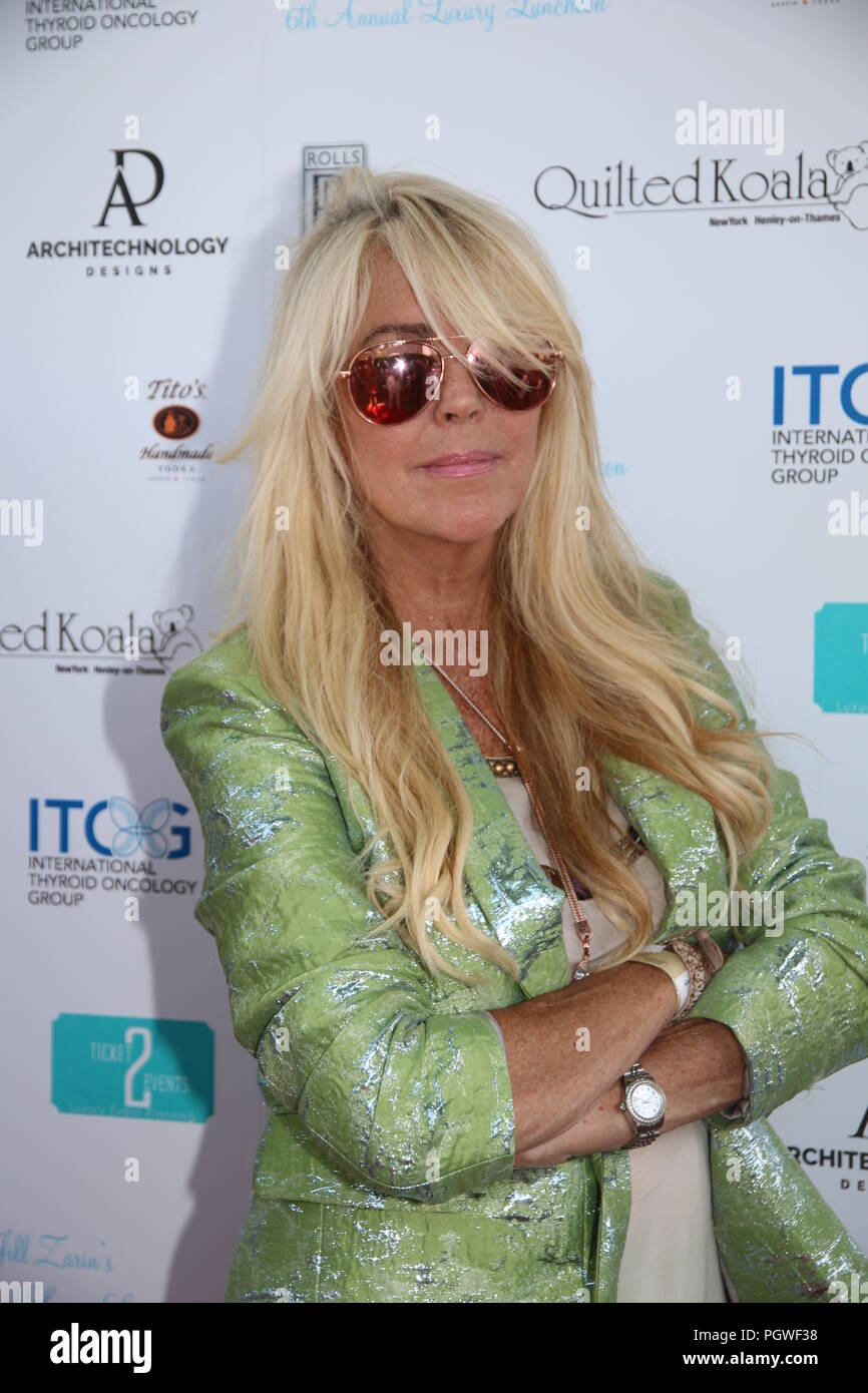 Jill Zarin 6th Annual Luxury Luncheon at Topping Rose House in Bridgehampton, NY  Featuring: Dina Lohan Where: Bridgehampton, New York, United States When: 28 Jul 2018 Credit: IZZY/WENN.com Stock Photo