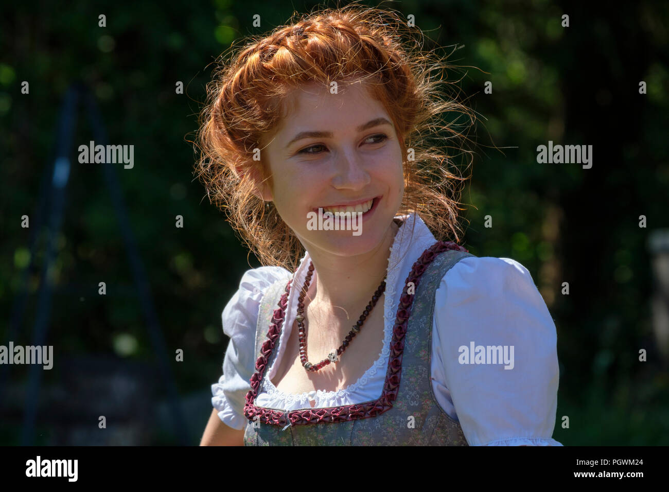 Girl With Braided Hairstyle And Dirndl Upper Bavaria