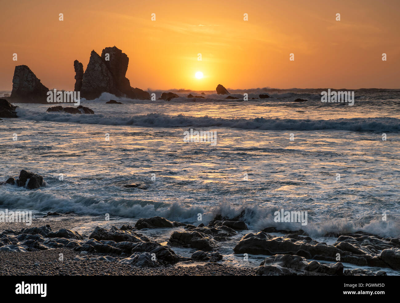 Sunset on the beach Playa del Silencio, Castañeras, Costa Verde, Asturias, Spain Stock Photo