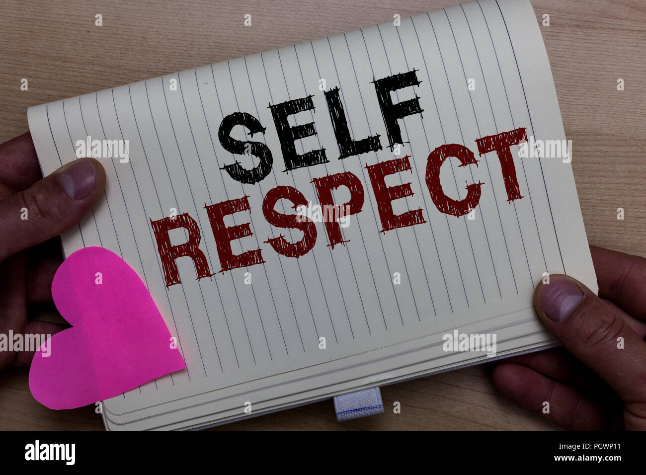 Word writing text Self Respect. Business concept for Pride and confidence in oneself Stand up for yourself Man holding notebook paper heart Romantic i Stock Photo