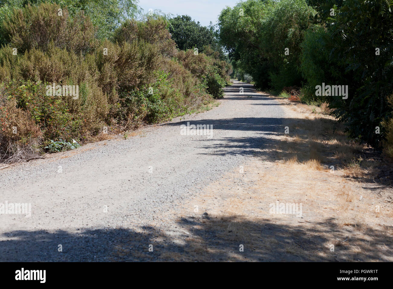 Gravel road in rural area - California USA Stock Photo
