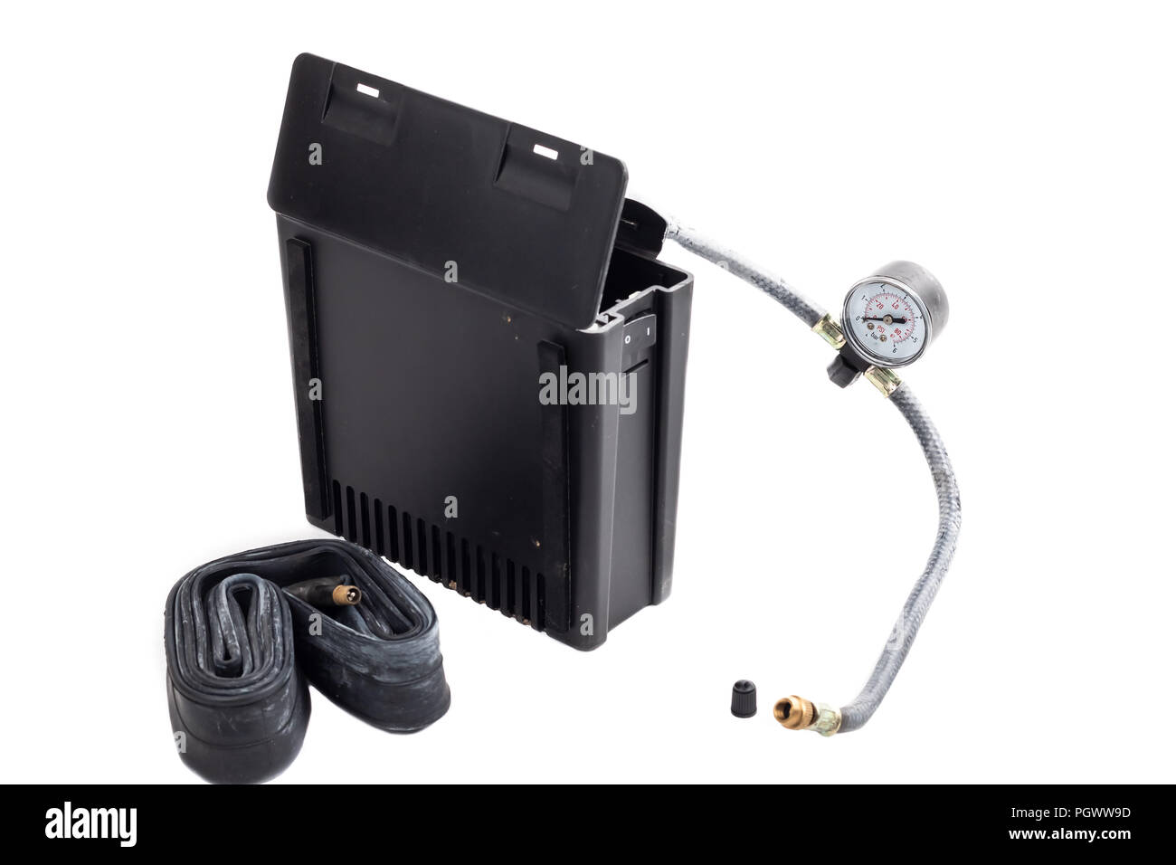 mini car air compressor on white background in studio Stock Photo