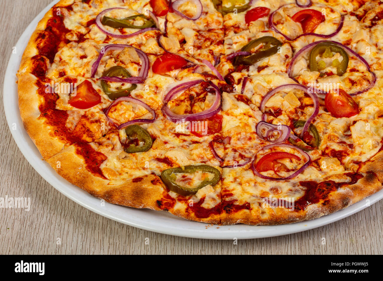 Pizza with chicken and cheese Stock Photo Alamy