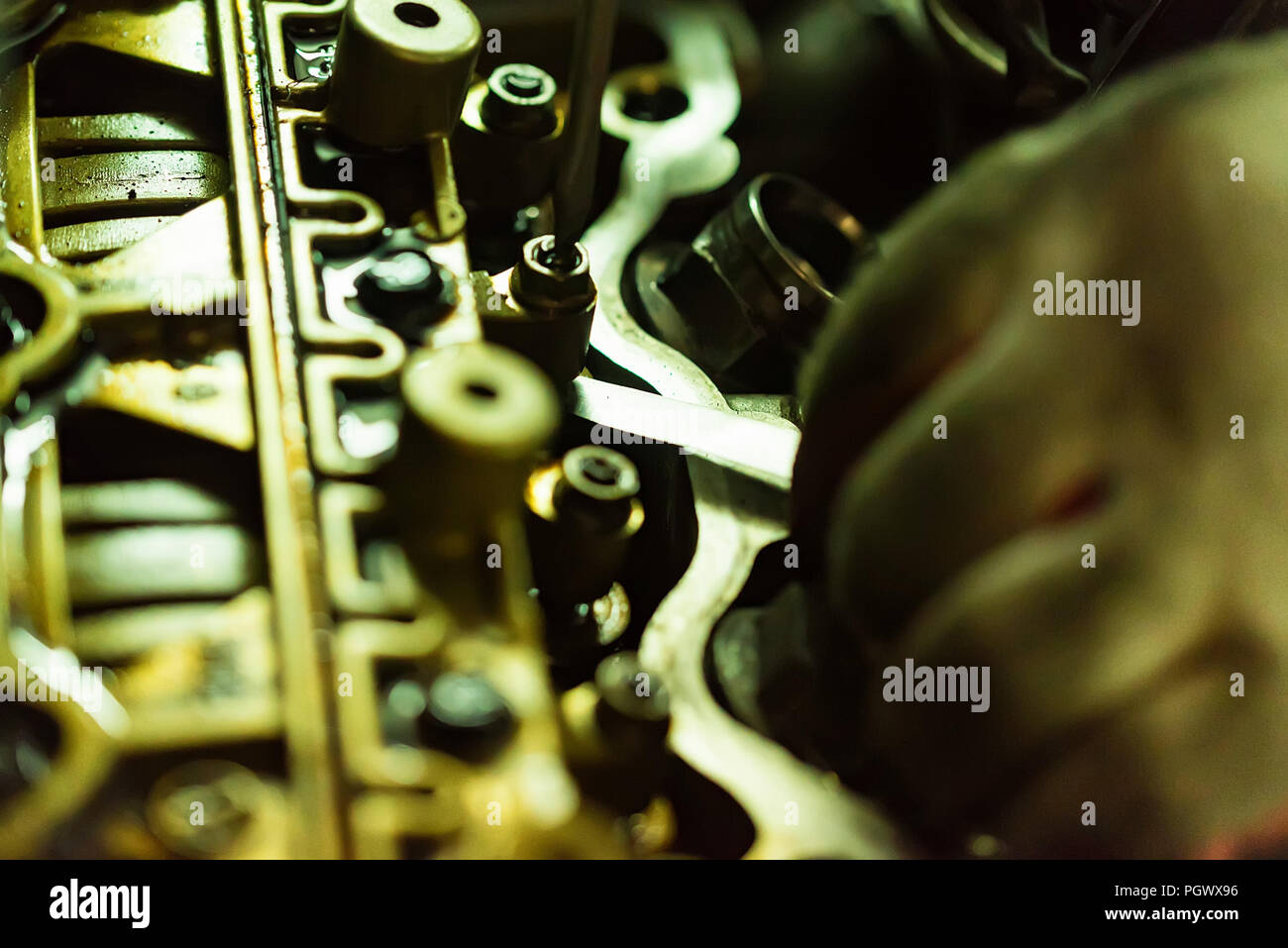 Maintenance check and adjust valve lash in car engine Stock Photo Alamy
