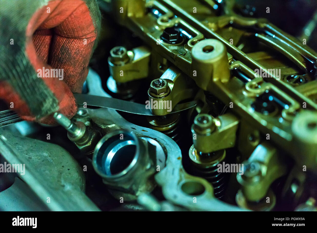 Maintenance check and adjust valve lash in car engine Stock Photo Alamy