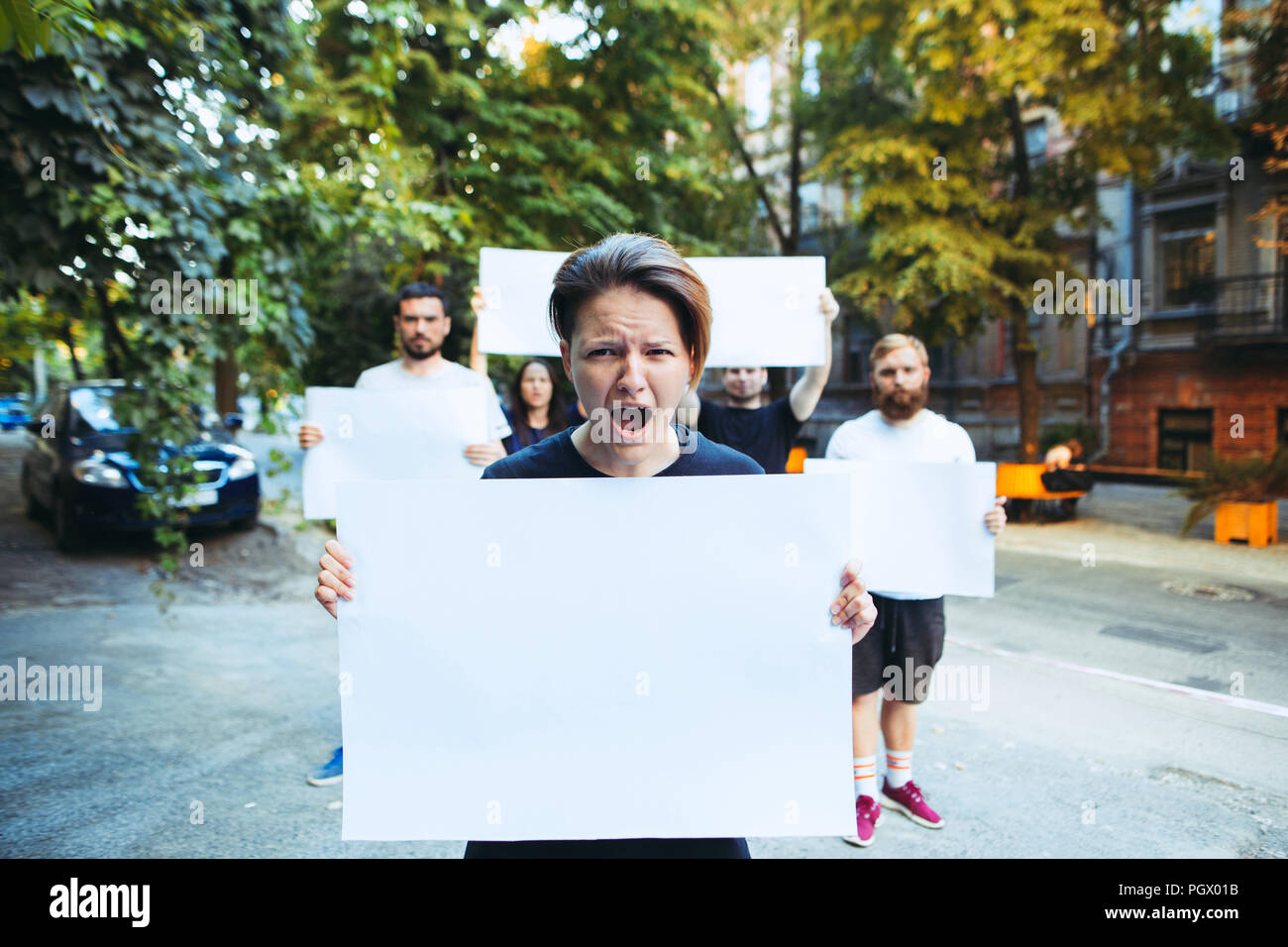 Angry man holding empty protest hi-res stock photography and images - Alamy
